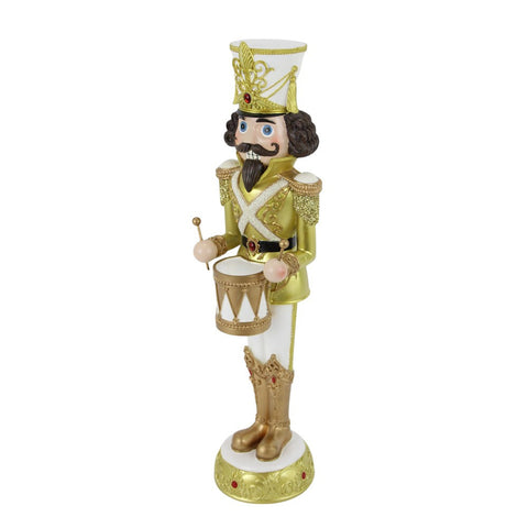 19.75" Gold and White Resin Nutcracker, shoptreeboutique.com